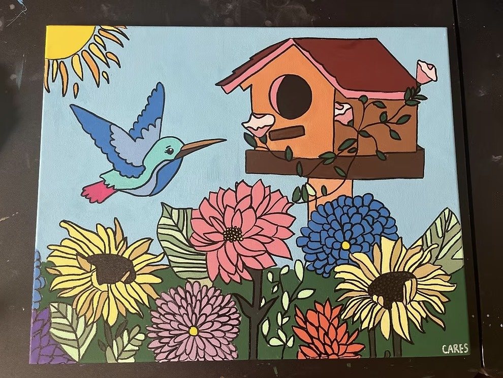 The finished painting "Burst of Blooms": a hummingbird, a birdhouse, sunflowers, and dahlias